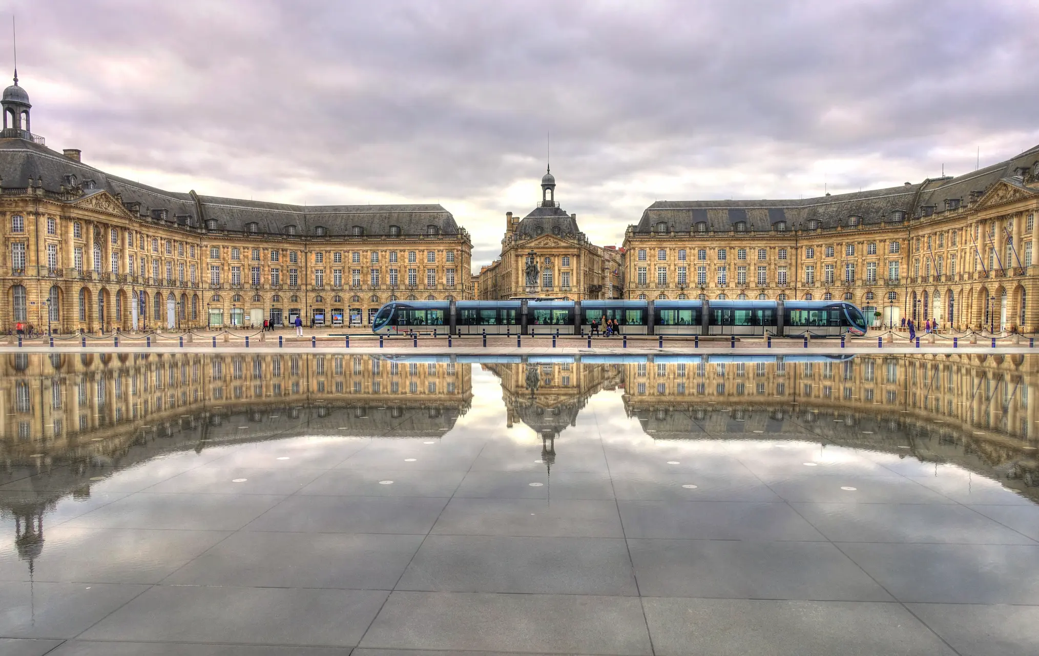 Place de la Bourse and Bordeaux tram reflected in the Miroir d’Eau, Bordeaux, France