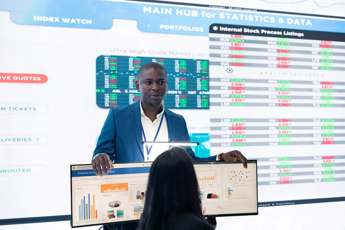 MBA student presenting business intelligence dashboards, financial analytics, and data-driven insights during a business strategy presentation at International American University Bordeaux.